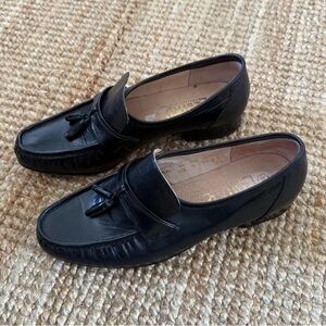 Black leather tassel loafers